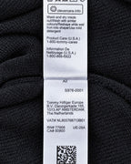 Tommy Hilfiger Stehkragenpullover in Schwarz, Größe M – Pflegeetikett mit Artikelnummer